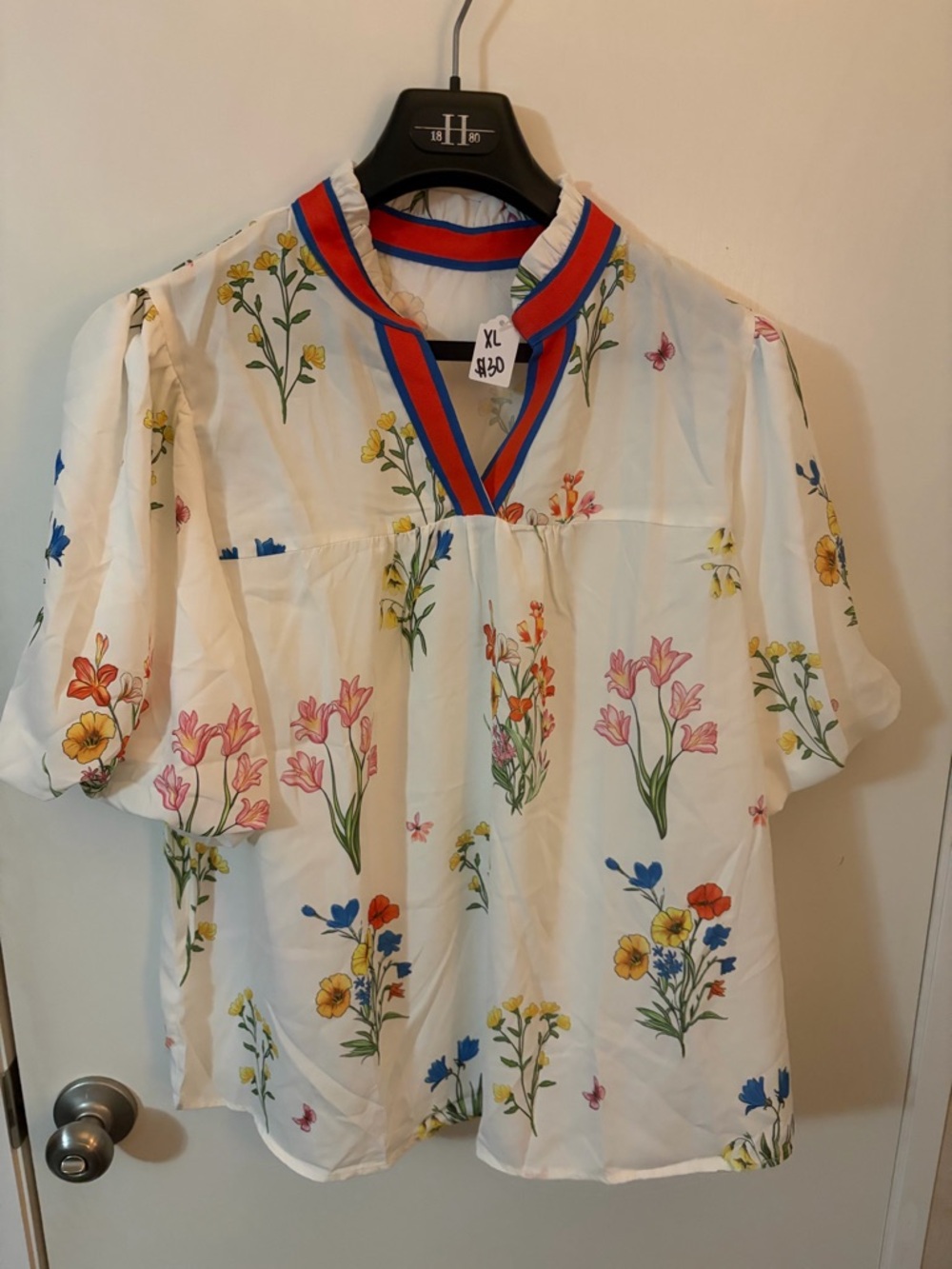 White Floral V-Neck Blouse with Red-Blue Trim